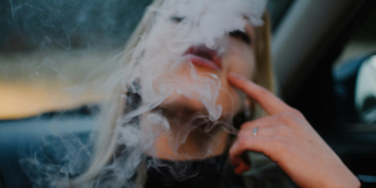 What Smoking Really Does to Your Skin, According to a Dermatologist
